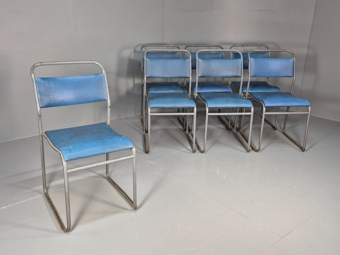 7 1950s Stacking Village Hall Chairs PEL style models in Blue Vinyl EB9470 MSTA - UKDK FURNITURE