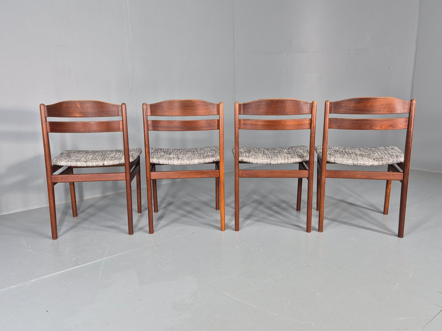 Set of four dining chairs with silver and deep blue seat pads EB11892