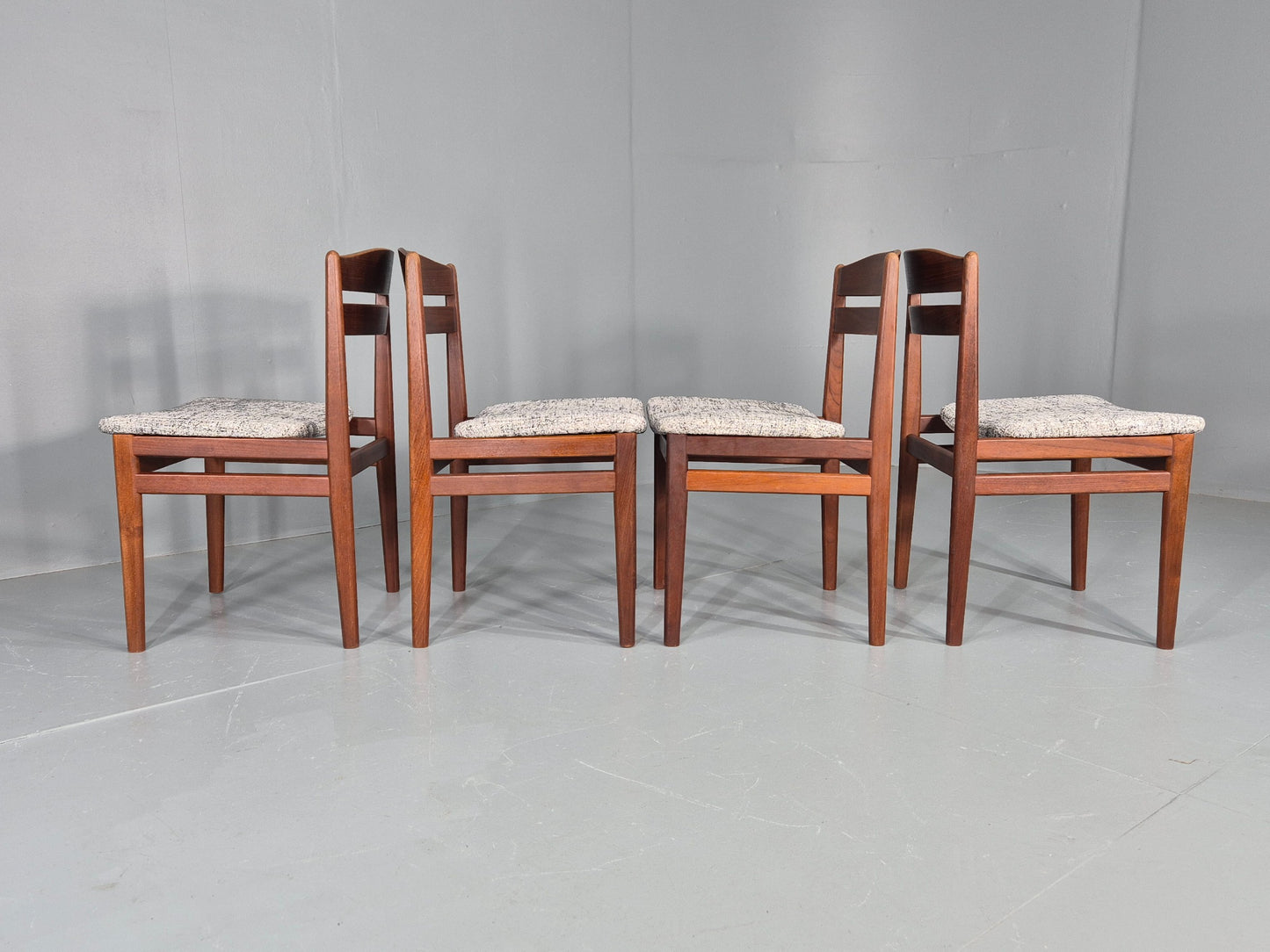 Set of four dining chairs with silver and deep blue seat pads EB11892